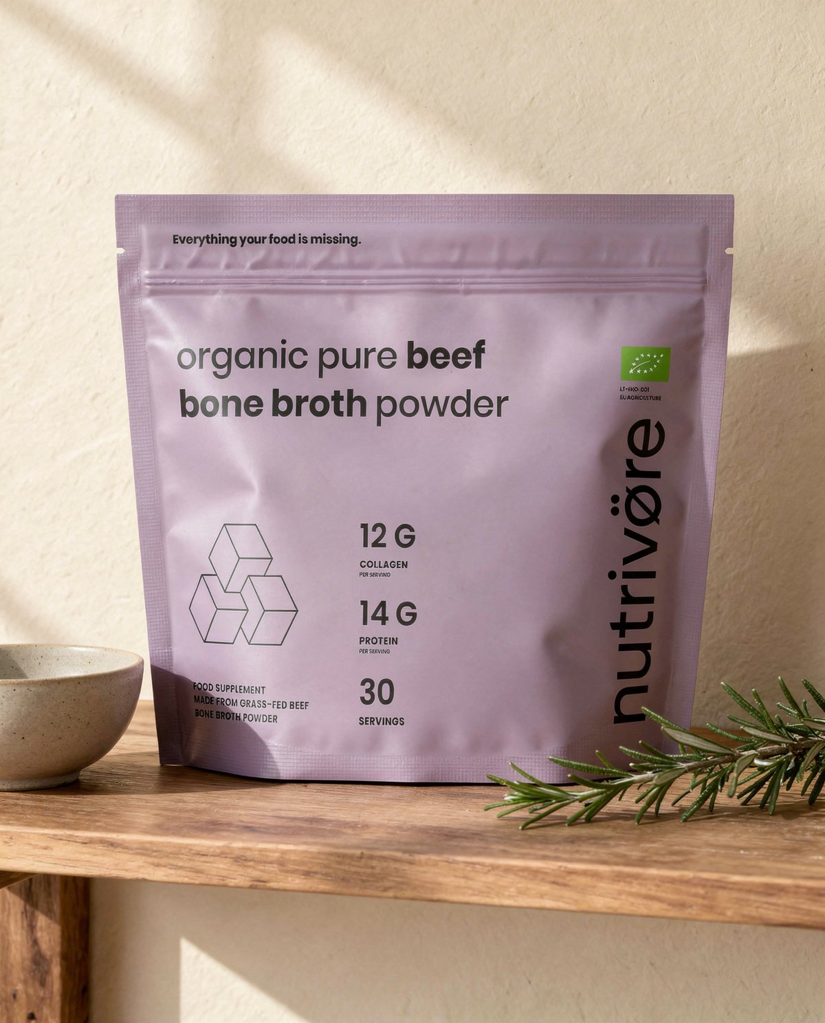 Nutriōteca Bone Broth pouch on a kitchen shelf with rosemary